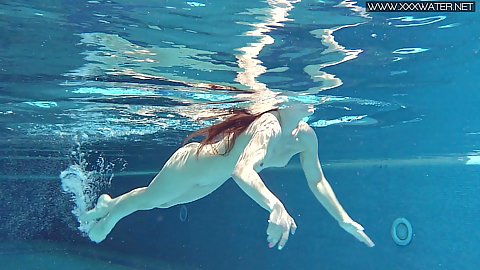 Nude swimming redhead petite small boobed nubile Nicole Pearl solo
