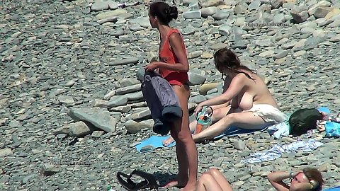Undressing first time goer to a nude beach afraid strangers will spy on her naked body outdoors