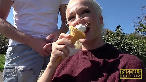 Heavenly blonde milf in public outdoors Cindy Sun enjoying an ice cream on a nice sunny day talking to us before we head inside