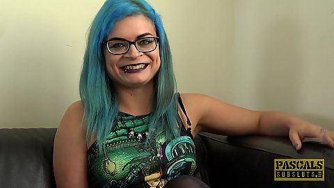 Blue haired friendly talking milf in glasses in pre fuck tape footage of Caitlin Minx