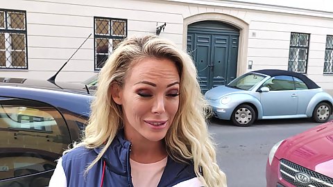 Blonde stepmom on the street Isabelle Deltore looking to have a good time today in Budapest