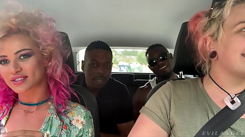 Driving around in car with public pink haired girls Cherry Kiss taking pair of massive black cock males to a salvage yard outdoors