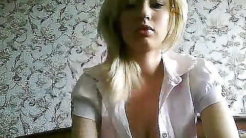 Cute teen in a sexy outfit lifs up skirt to touch pussy