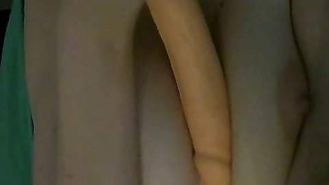 Fucking a dildo a natural busty teen on home video
