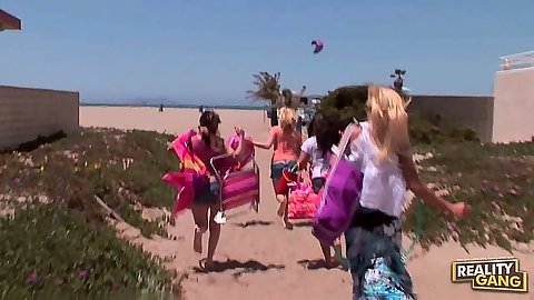 Lesbians Lynn Love and JC Simpson and Kandi Milan go to the beach