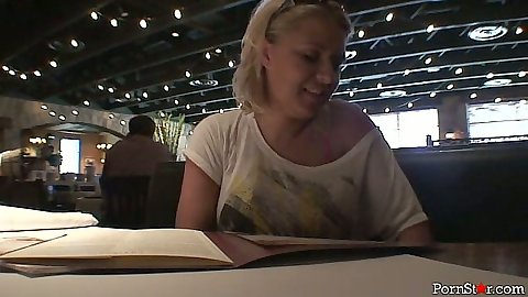 Having a bite in public with blonde Riley Evans