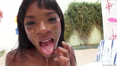 Slobbered up with saliva face after sloppy oral from ebony Ana Foxxx working on large white penis outdoors