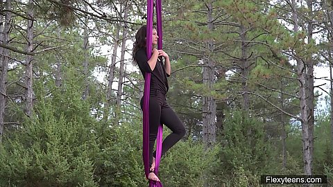 Outdoors in the forest Kim Nadara wanted to show off her rope dancing skills as an acrobat