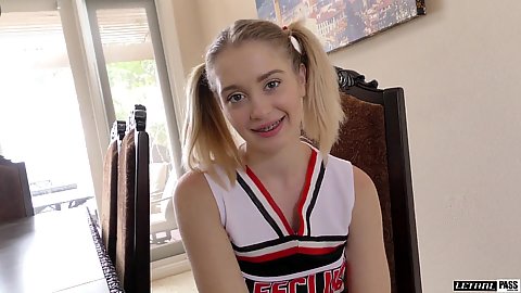 Pigtails cheerleader in uniform smiling for camera and then playing with her own snatch before sex Anastasia Knight