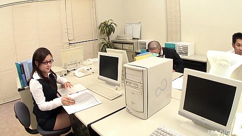 New office girl asian hottie in glasses is working behind her computer and men want to touch her all over in a group