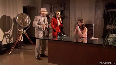 Story based receptionist scene of Penny Flame calling in help during retro clothing themed setting