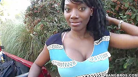 Ebony hottie with big tits in the garden