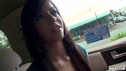 Teen latina Layla Lopez driving around in a miniskirt in backseat on the street